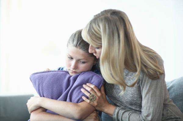 image of mother consoling and connecting with her daughter