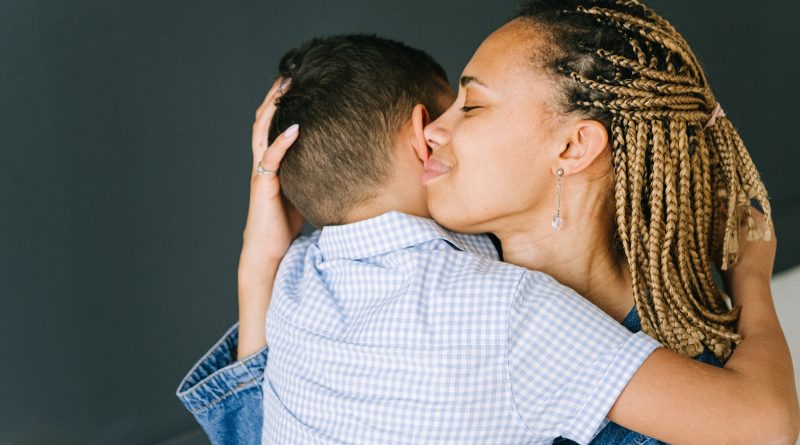 Mom comforting son